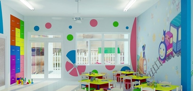 Góc lớp được kê bàn ghế màu sắc phục vụ việc học tập của các bé 